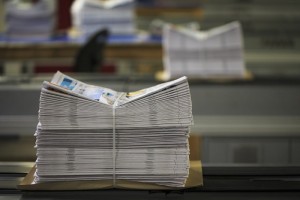 Copies of first edition of Trinity Mirror's new national newspaper The New Day come off the printing presses at the Trinity Mirror Printing plant in Watford.